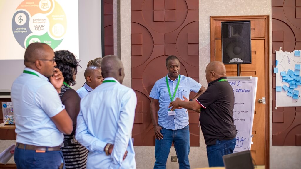 Kenya LAP Meeting with the ILM Wheel visible in the background 1024 px